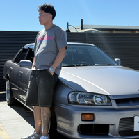 80's Club Tee in grey worn with a Nissan Skyline R34