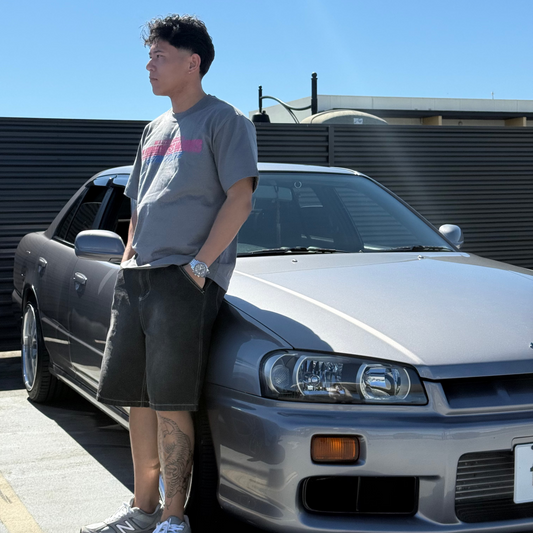 80's Club Tee in grey worn with a Nissan Skyline R34